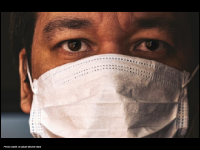 Man wearing a face covering
